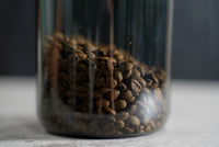 MCOFFEE vacuum airtight coffee bean container front view